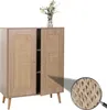 A wooden cabinet with rattan doors and a vase of flowers on top, shown against a white background. Podgląd zdjęcia produktu