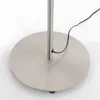 The base of a floor lamp with a power cord. Produktbild-Vorschau