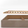 A disassembled bed frame and mattress base shown against a white background. Náhled obrázku produktu