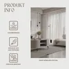 A living room scene featuring a ribbed coffee table with shelves on legs, a rug, a sofa, and decorative elements. Produktbild-Vorschau