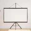 A white projection screen with a black frame and tripod stand is shown against a white wall and wooden floor. Podgląd zdjęcia produktu