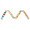 A wooden balance beam toy with colorful climbing holds. Produktbild-Vorschau