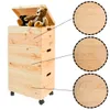 Three stacked wooden storage boxes with lids and wheels, with teddy bears on top and carved animal designs on the sides. Produktbild-Vorschau