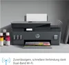 A printer with ink bottles on a shelf, with text about Wi-Fi connectivity. Podgląd zdjęcia produktu