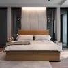 A modern bedroom with a large bed as the focal point. Produktbild-Vorschau