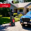 A pressure washer and a blue car are parked in front of a house. Náhled obrázku produktu