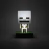 A Minecraft Skeleton icon light sits on a green block base against a dark gray background. Náhled obrázku produktu