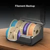 A filament storage box with multiple spools of filament inside, shown on a wooden surface. Produktbild-Vorschau
