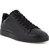 A black leather sneaker is shown from a side angle against a white background. Voir les images du produit