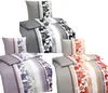 A collage of bedding sets with floral patterns and stripes. Produktbild-Vorschau