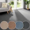 Teppichboden als Auslegware in anthrazit mit Farbmustern in beige, cognac, blau. 
 Produktbild-Vorschau