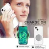 A woman is holding a clear phone case, with graphics showing wireless charging and MagSafe compatibility. Produktbild-Vorschau