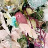 Close-up of a decorated Christmas tree with various ornaments. Náhľad obrázku produktu
