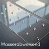 Close-up of two screen protectors with water droplets on them, set against a dark background. Text overlay at the bottom. Produktbild-Vorschau