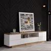 A modern living room setting with a TV stand against a black chevron-patterned wall. Voir les images du produit