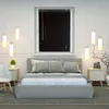 A bedroom scene with a bed, nightstands, and hanging lamps. Produktbild-Vorschau