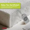 A close-up of a foam material with an Oeko-Tex certification tag. Produktbild-Vorschau