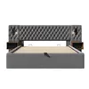 A studio shot of a gray upholstered bed with integrated nightstands and reading lamps. Náhled obrázku produktu