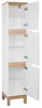 A tall, narrow white cabinet with three doors and wooden accents, standing on wooden legs. Podgląd zdjęcia produktu