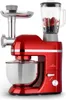 A red kitchen mixer with attachments, including a meat grinder and a blender jar filled with berries, is shown against a white background. Produktbild-Vorschau
