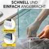 A person is installing a clear plastic seal onto a glass shower door. The image includes diagrams showing the installation process. Produktbild-Vorschau