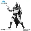 A black and white action figure of Batman holding a weapon, presented on a white background. Anteprima dell’immagine prodotto