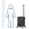 A diagram showing a person's height next to a wood-burning stove for scale. Produktbild-Vorschau
