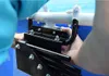 Close-up of hands assembling a pool accessory. Anteprima dell’immagine prodotto