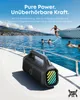 A portable speaker is on the deck of a boat, with people swimming in the ocean in the background. Voir les images du produit