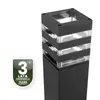 A black outdoor bollard light with clear glass panels, shown against a white background. A warranty badge is present in the lower left corner. Podgląd zdjęcia produktu
