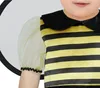 Close-up of a child wearing a bee costume. Produktbild-Vorschau