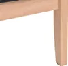 A close-up view of the wooden leg of a chair or sofa. Náhled obrázku produktu