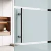 A close-up view of a glass sliding door with a silver handle, set against a backdrop of modern cabinetry and shelving. Produktbild-Vorschau