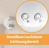 A close-up of a motion sensor mounted on a ceiling, with a magnified view of its adjustment dials. Produktbild-Vorschau