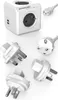 A white power cube with multiple plug adapters and a power cord on a white background. Produktbild-Vorschau