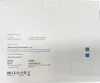 The image shows the back of a product box with text and regulatory symbols. Produktbild-Vorschau
