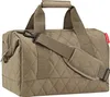 A close-up studio shot of a quilted duffel bag. Náhled obrázku produktu