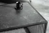 A close-up of a black marble-patterned coffee table with a black mug on it. Produktbild-Vorschau