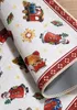 A close-up view of a folded Christmas-themed rug with various festive designs. Podgląd zdjęcia produktu