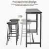 A bar table and two stools are shown, with two stools faded in the background to illustrate space-saving storage. Podgląd zdjęcia produktu