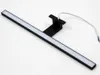 A black LED light bar with a white diffuser, mounted on a black bracket, with a white wire extending from it, set against a white background. Náhľad obrázku produktu