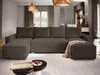 A spacious living room with a large sectional sofa, coffee table, and decorative elements. Produktbild-Vorschau
