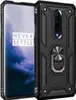 A black protective phone case with a ring holder is shown next to a smartphone. Produktbild-Vorschau