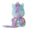 The back view of a plush unicorn toy with iridescent wings and a rainbow-colored mane and tail. Podgląd zdjęcia produktu
