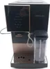 A Cecotec coffee machine with a touch screen display and a milk frother container. Produktbild-Vorschau