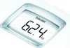 A close-up of a digital scale displaying a weight reading. Anteprima dell’immagine prodotto