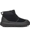 A black UGG boot is shown from the side against a white background. Voir les images du produit