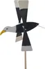 A wooden wind spinner shaped like an eagle, mounted on a wooden pole. Podgląd zdjęcia produktu