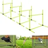 A collage of images showing dog agility equipment and dogs using it in a grassy outdoor setting. Produktbild-Vorschau