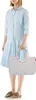 A woman is standing and holding a shopping bag. Podgląd zdjęcia produktu